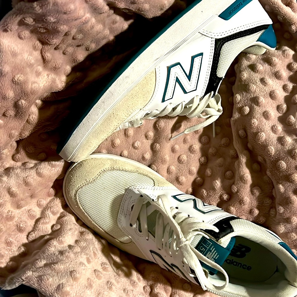 Green and white new balance 574 men’s